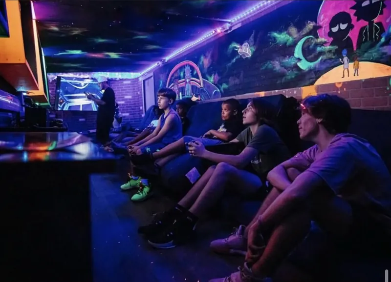 StarrKiddz Game Bus, in use, mural by JustBee