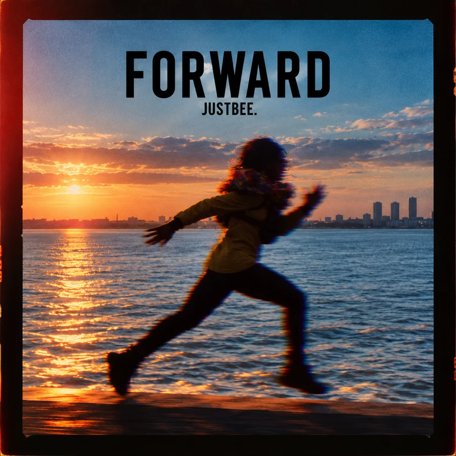 Forward single cover: JustBee running along the waterfront at sunset