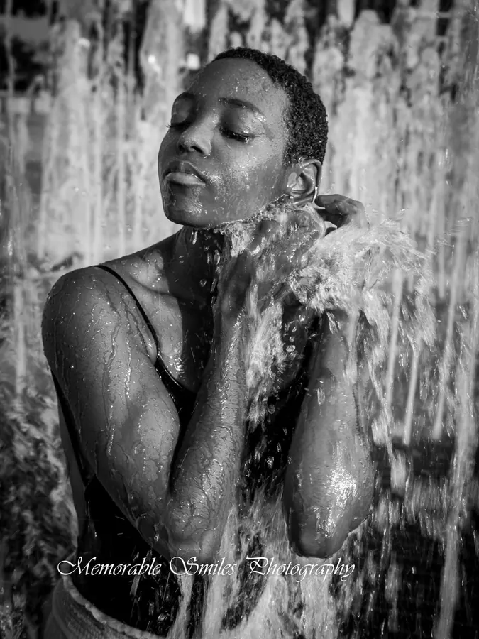 JustBee in a fountain, black and white